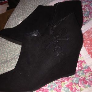 Black wedge booties